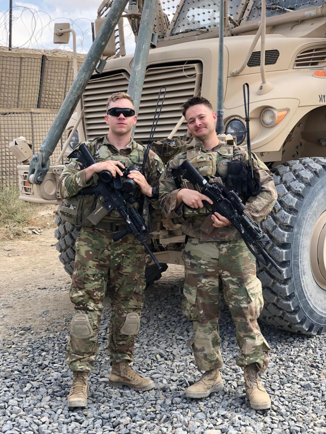 two soldiers on deployment