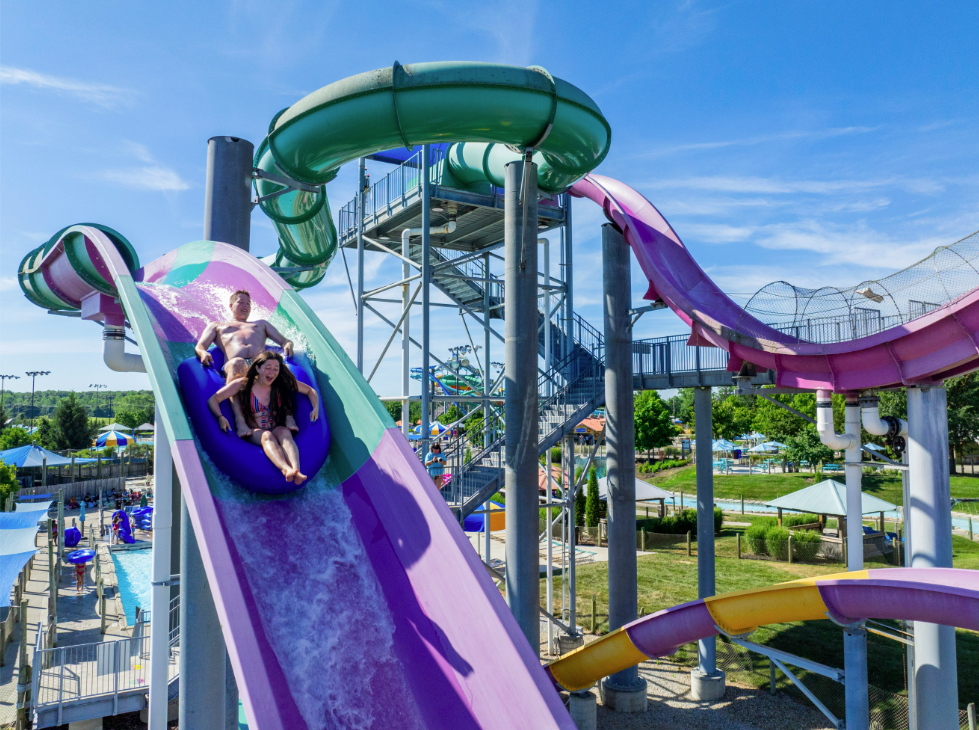 waterpark guests going down slide