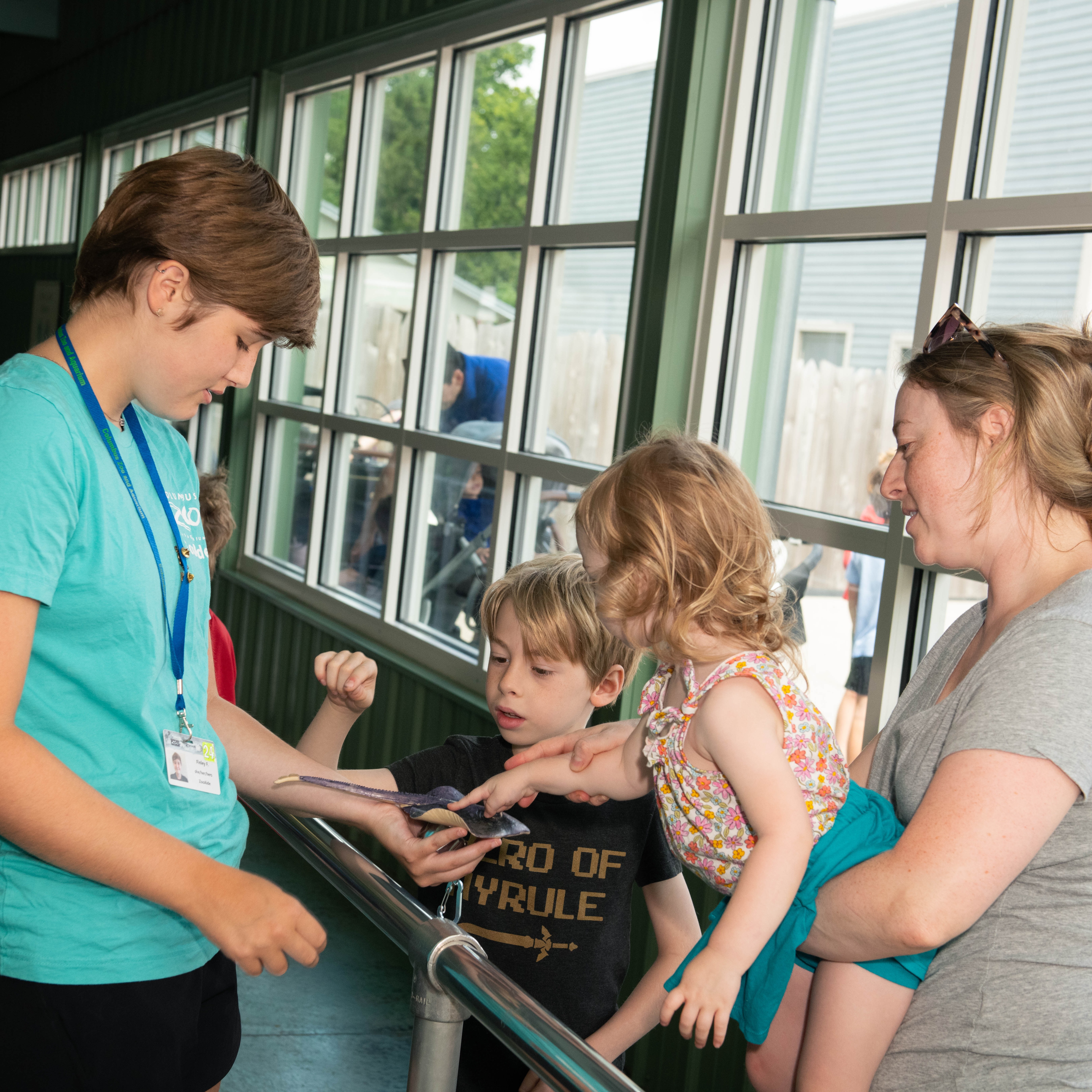 team member with zoo guests