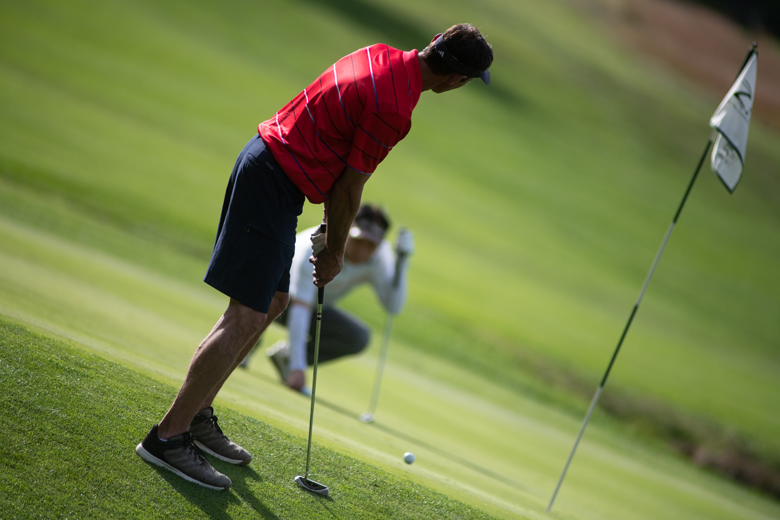 man golfing