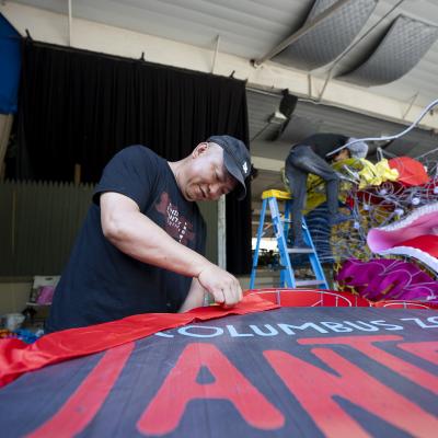 man painting sign