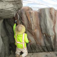 artist painting rock