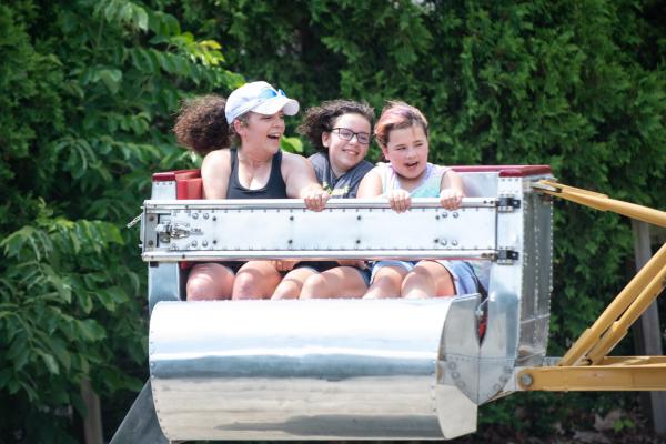 zoo guests on scrambler ride