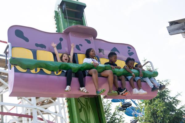 zoo guests on purple ride