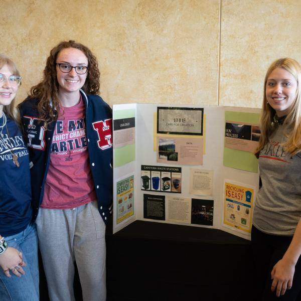 students with project poster