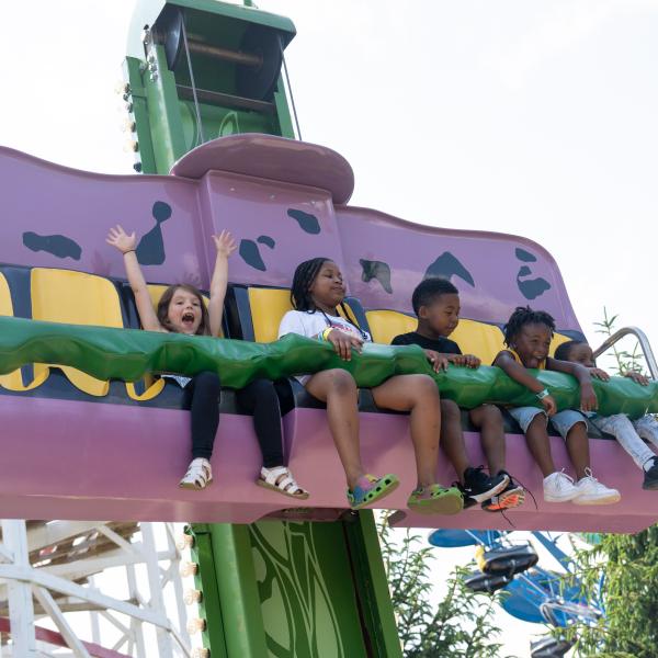 zoo guests on purple ride